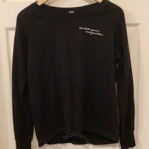 cute black crew neck with small white writing and bow detail!